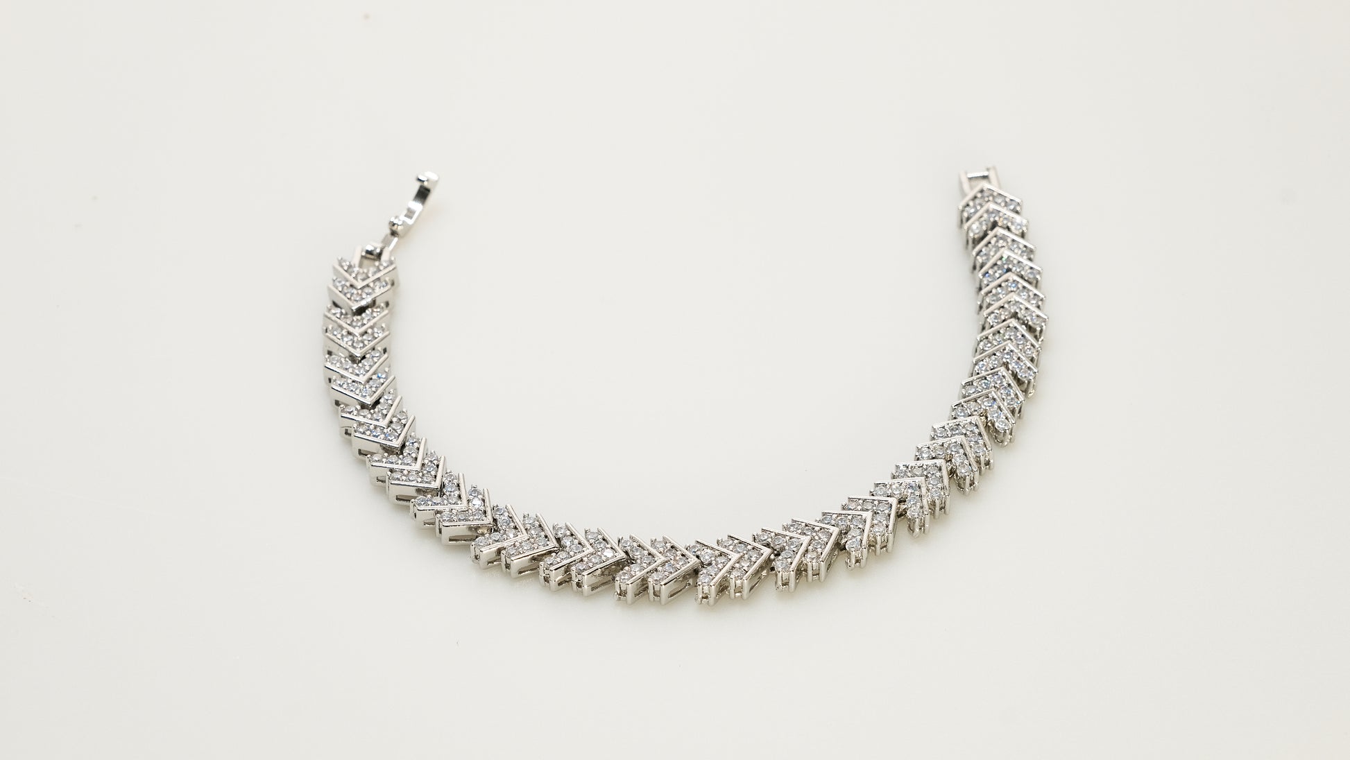 Copper plated 14k gold bracelet wholesale, platinum silver, irregular white zircon, buckle unique design - Lyra
