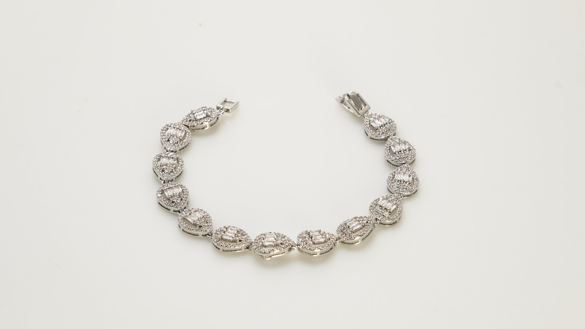 Copper plated 14k gold bracelet wholesale, unique design inlaid with irregular zircon, a must-have for fashionable gifts - Lyra